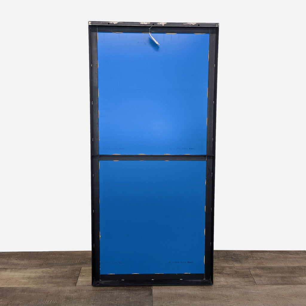 a blue cabinet with a metal frame and a black metal frame.