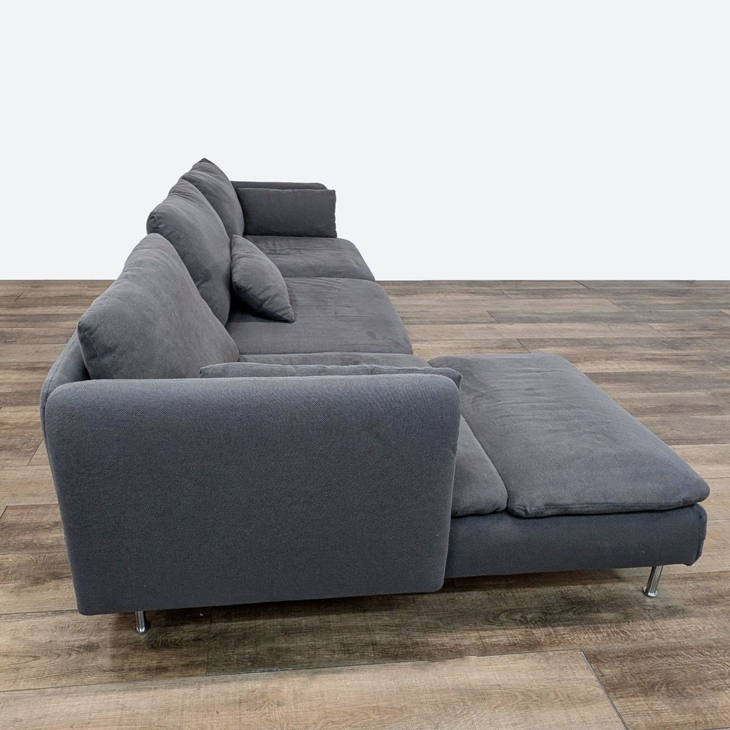 Side view of IKEA SÖDERHAMN sectional sofa in grey with metal legs, showcasing its chaise.