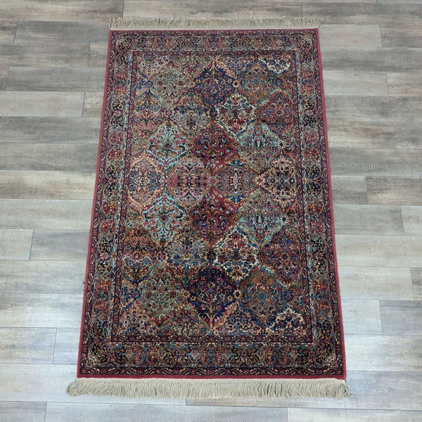 a large area rug with a geometric pattern.
