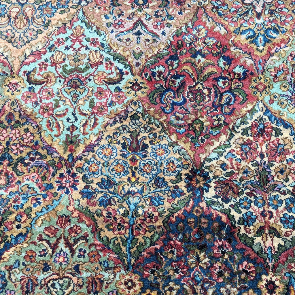 a close up of a large persian rug.