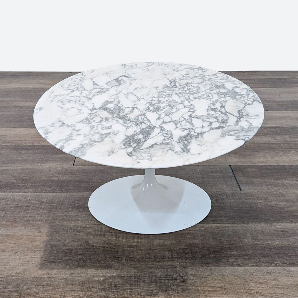 a marble table with a white marble top.