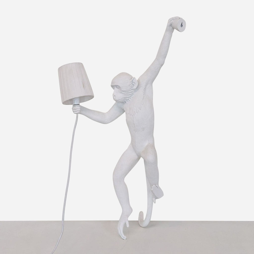 a sculpture of a man dancing