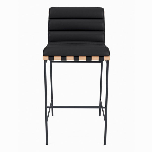 Black channel-tufted barstool with solid wood dowels and a powder-coated steel frame, front view.