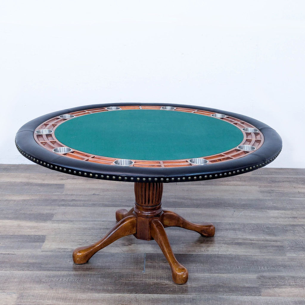 a black and white poker table with a black leather top and a black leather top.