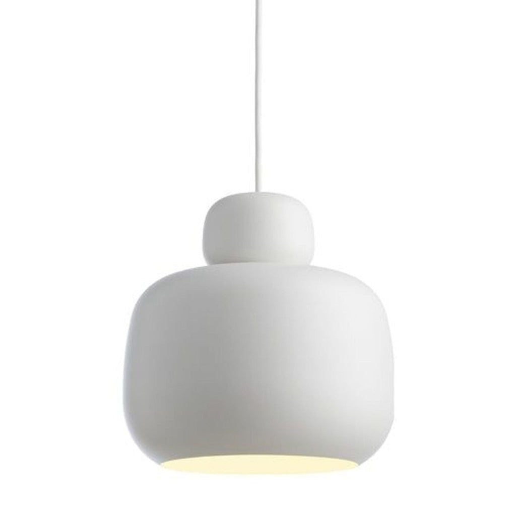 the light is a modern pendant light that is made from a single piece of plastic.