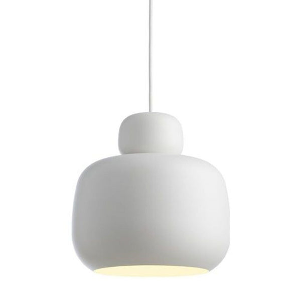 the light is a modern pendant light that is made from a single piece of plastic.