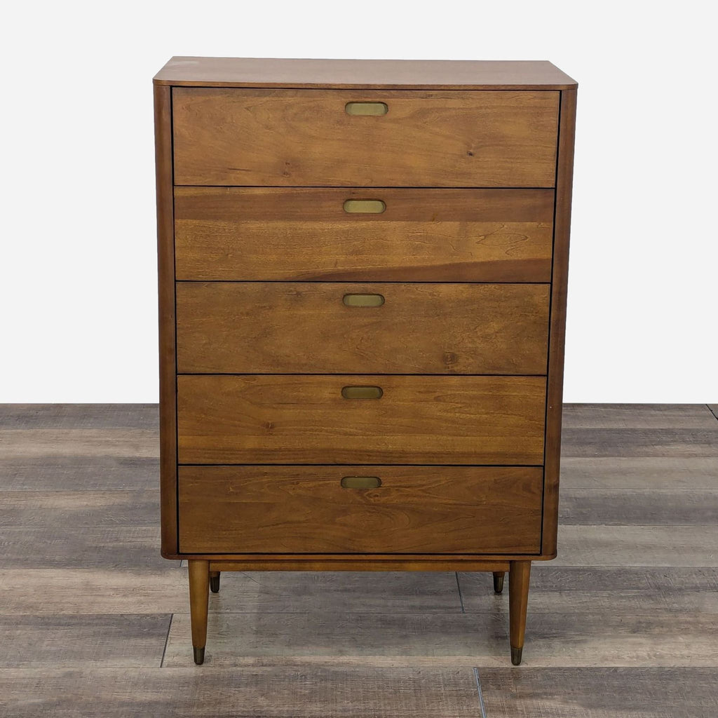 a mid century modern dresser with a drawer and four drawers.