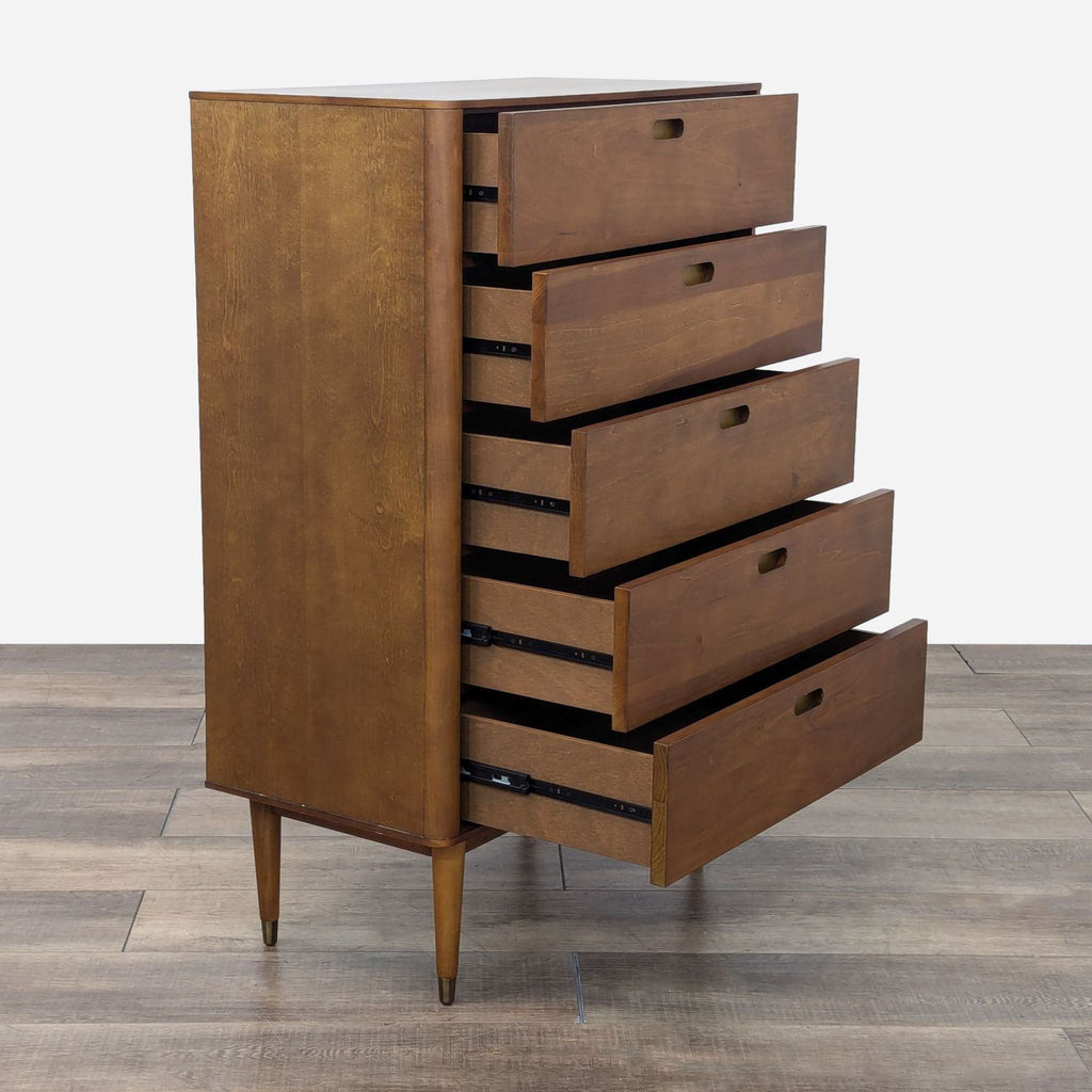 a vintage mid century modern chest of drawers