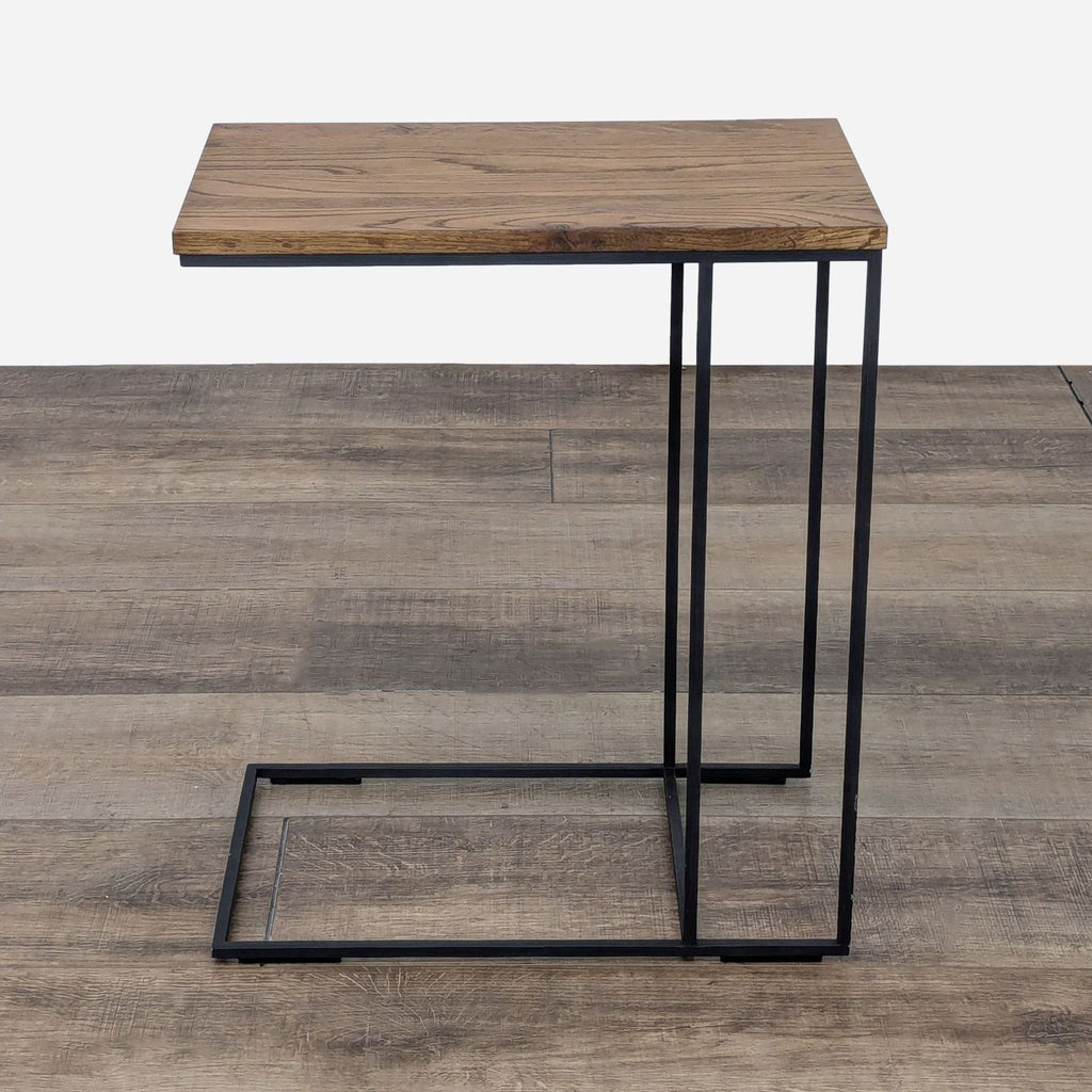 the modern side table is made from a solid wood and is made from a solid walnut wood.