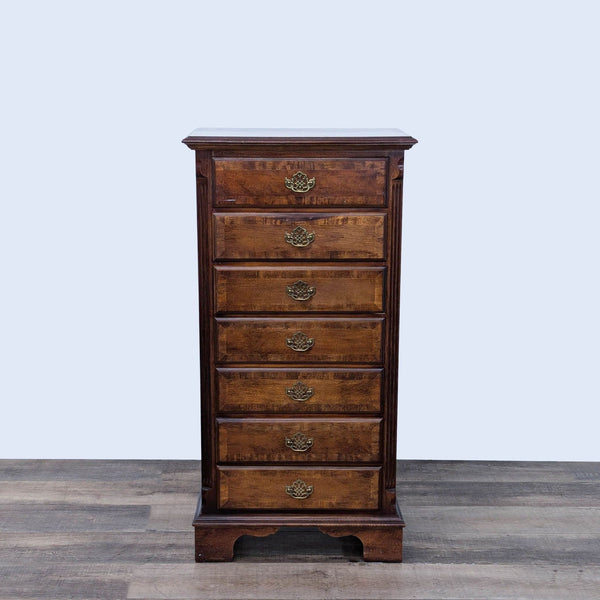 a mahogany chest of drawers with a drawer