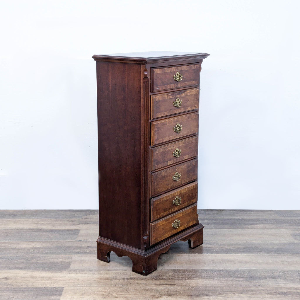 a mahogany chest of drawers with a drawer and a drawer.