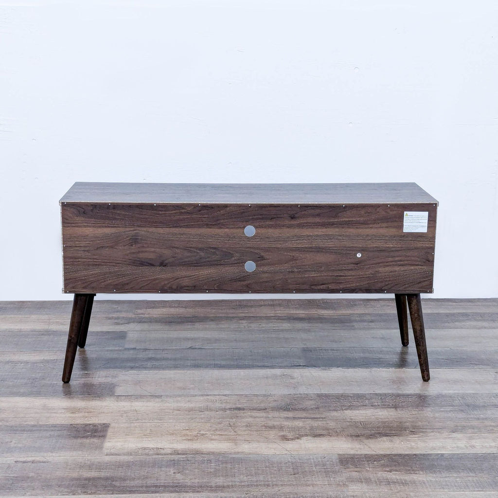 the [ unused0 ] chest is made of walnut and has a metal frame and a metal frame