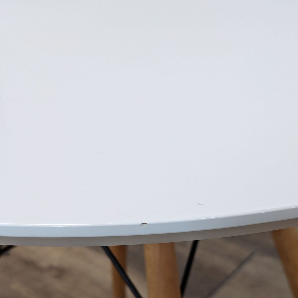 the table is made from a white plastic base.