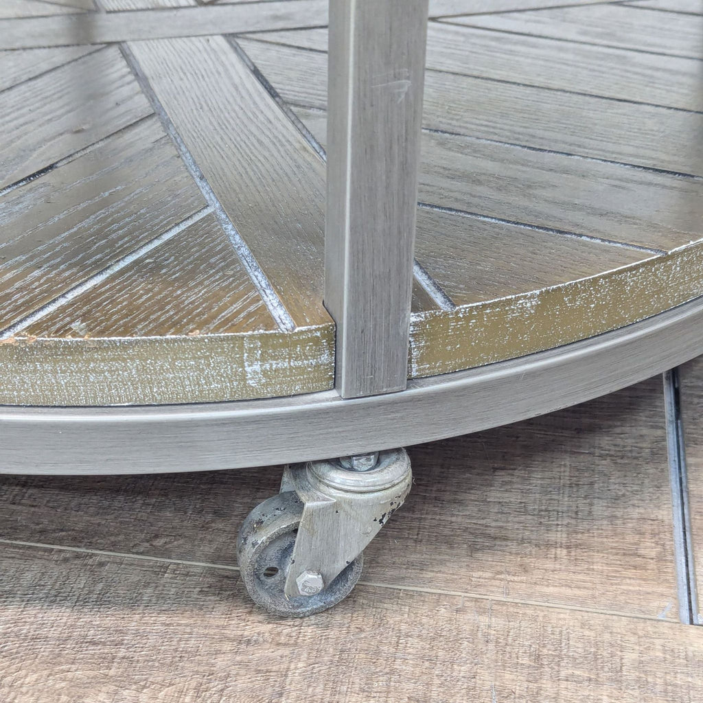 a close up of the metal legs of the table.