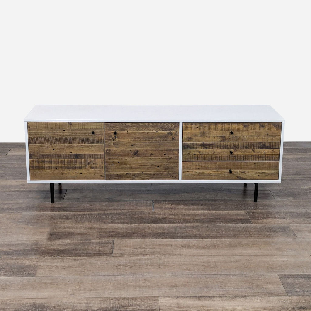 the modern sideboard is made of solid wood with a white top and black legs.