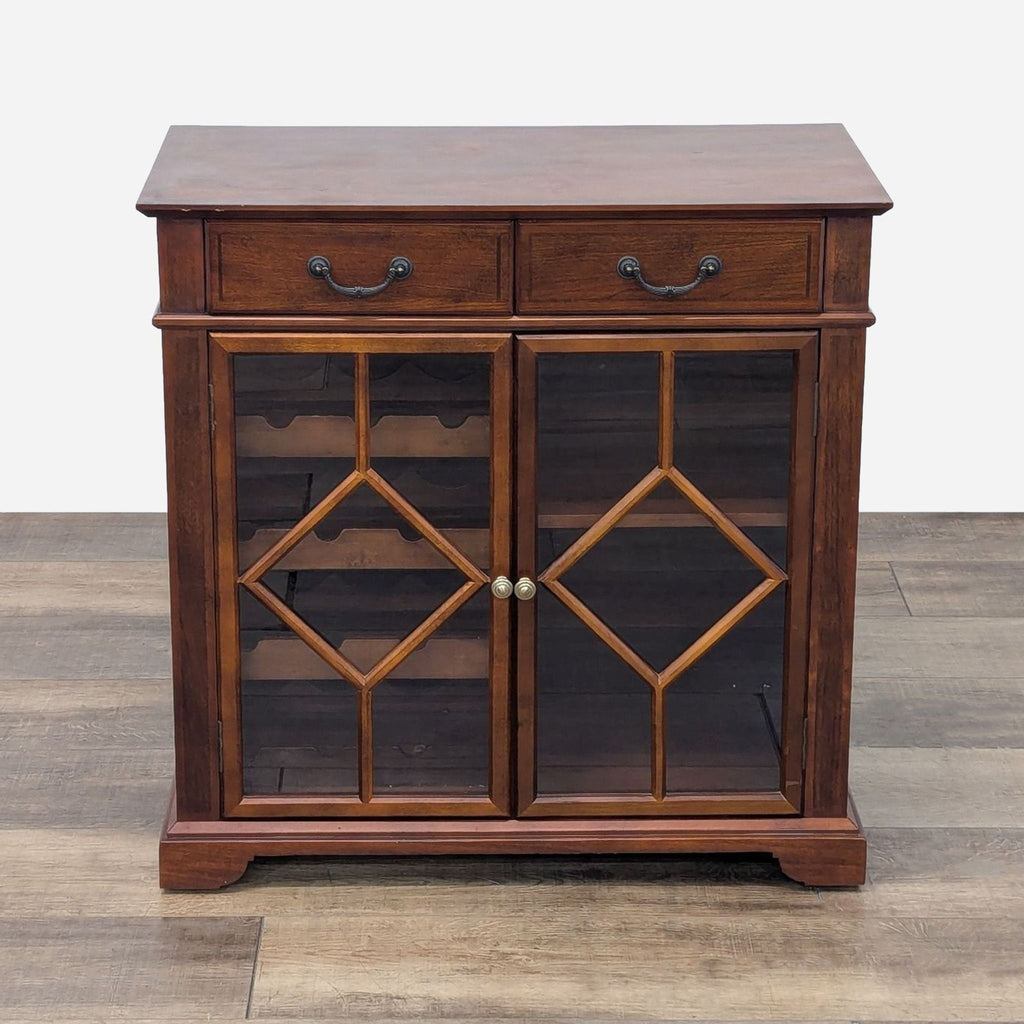 a large antique mahogany and glass cabinet.