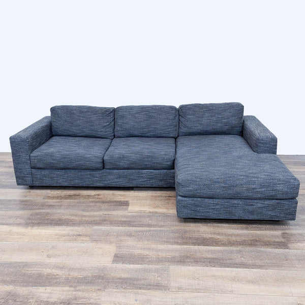 sofa is a modern sofa that is made of a soft fabric. the sofa is made of a