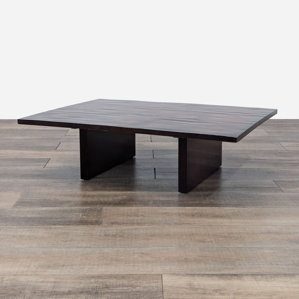 a coffee table in dark wood