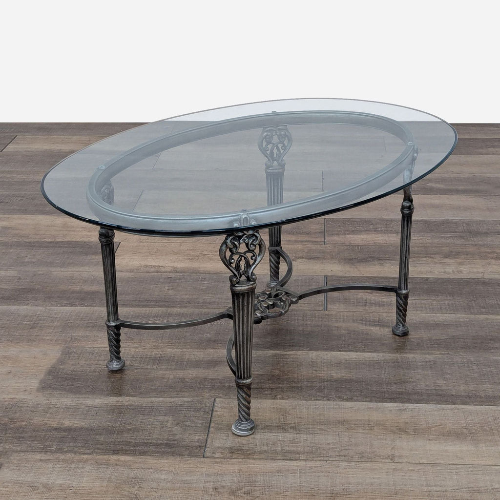 a large black glass top coffee table with a glass top.