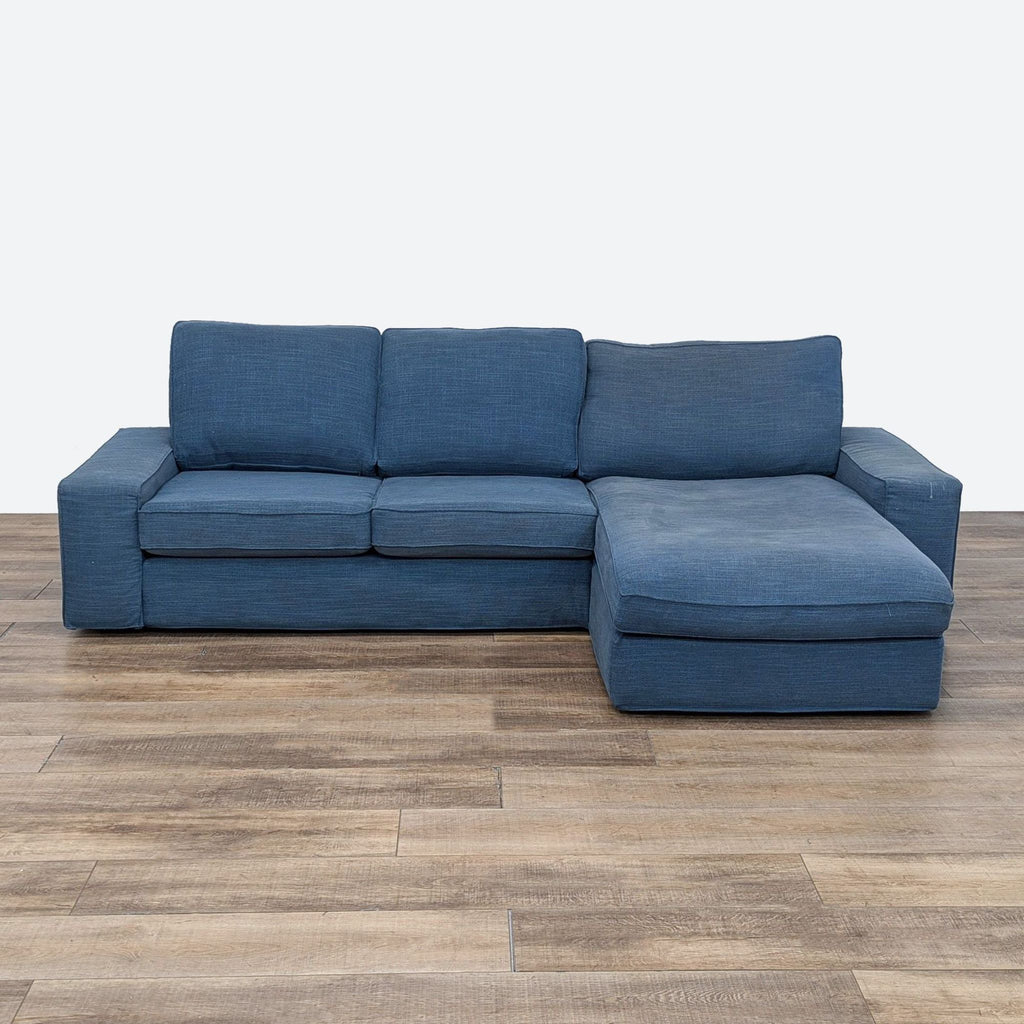 sofa in a blue color with a square shape, 3d rendering