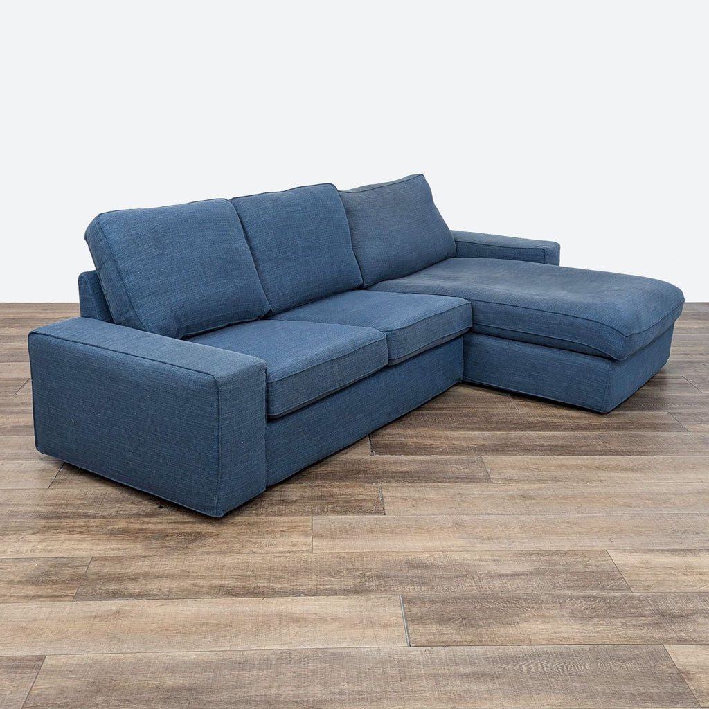 sofa set in blue fabric with a square shape and a square shape.