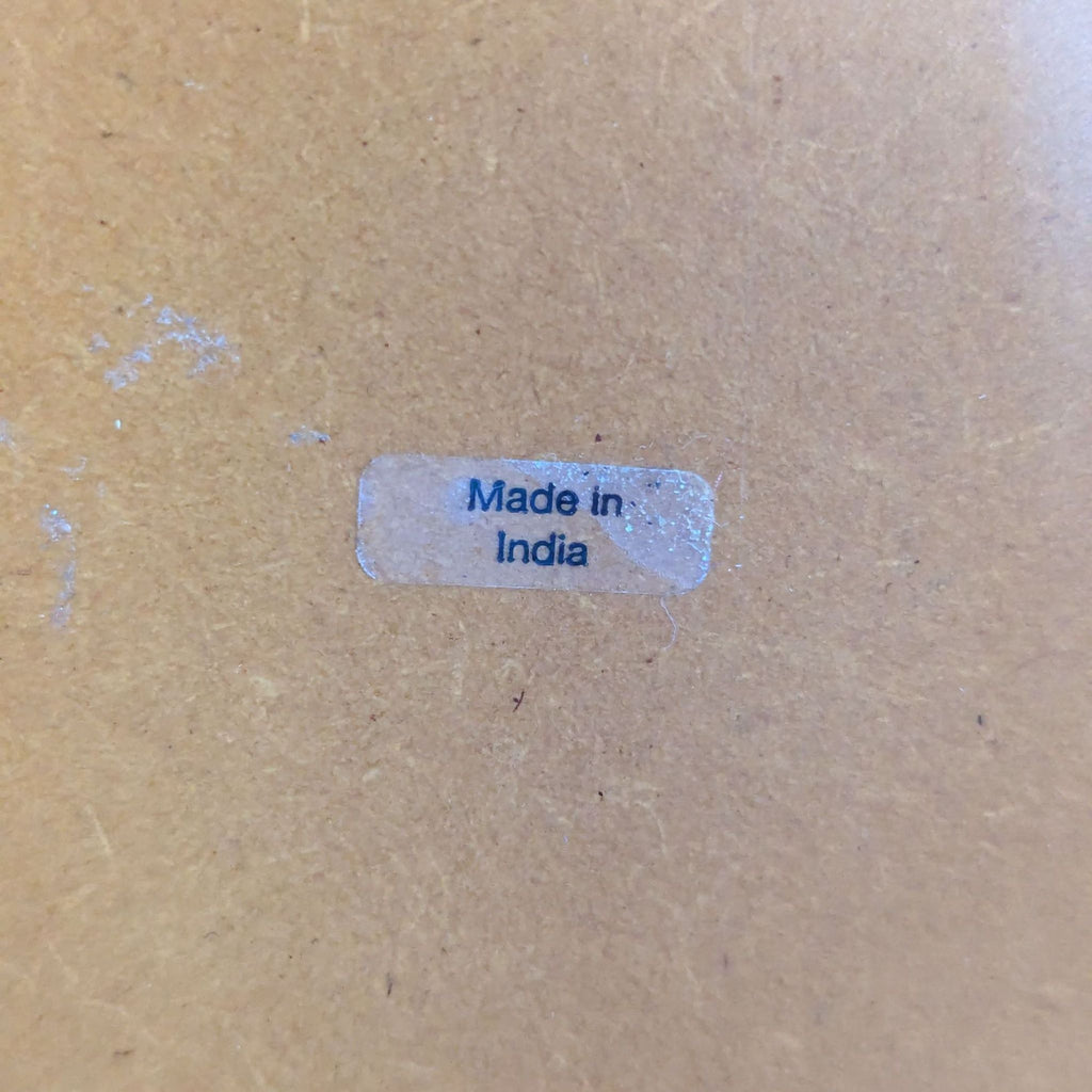 a label on a desk that says ' made in india '