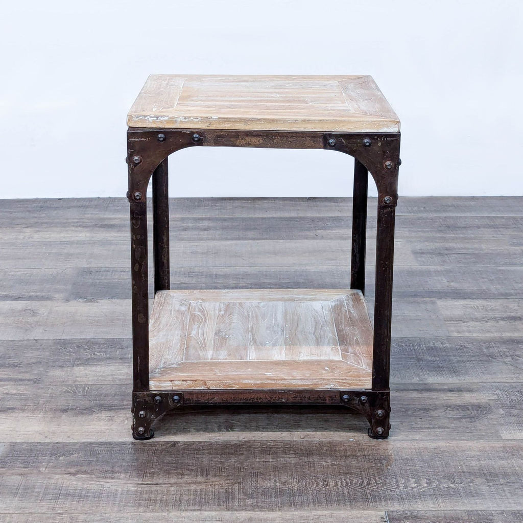 a vintage industrial side table with a shelf