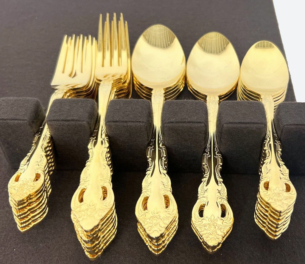 set of 12 gold plated china spoons and forks. the set is made of 18k