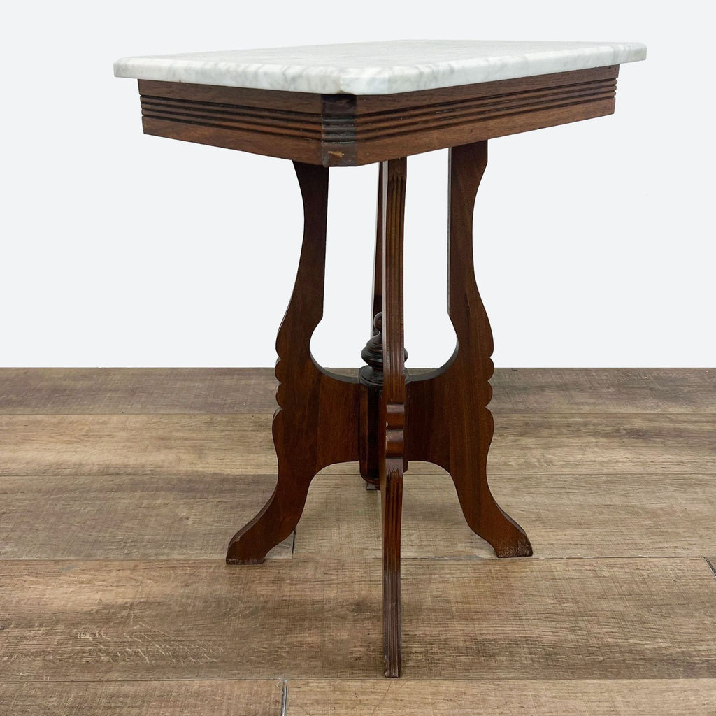 a [ unused0 ] mahogany and marble table