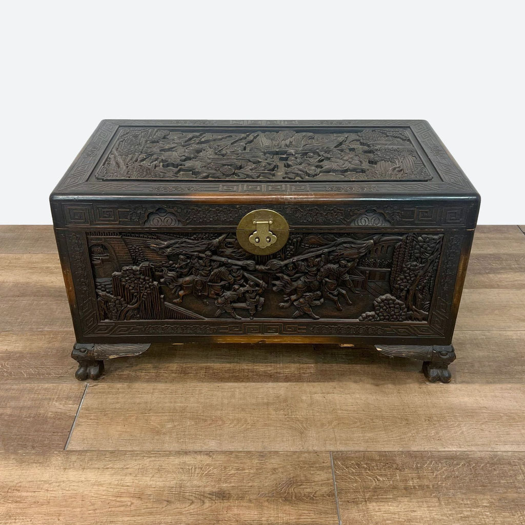 a chinese carved wood box with a lid