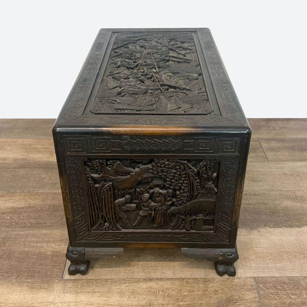 a chinese lacquer box with a carved wood lid and a carved wood lid.