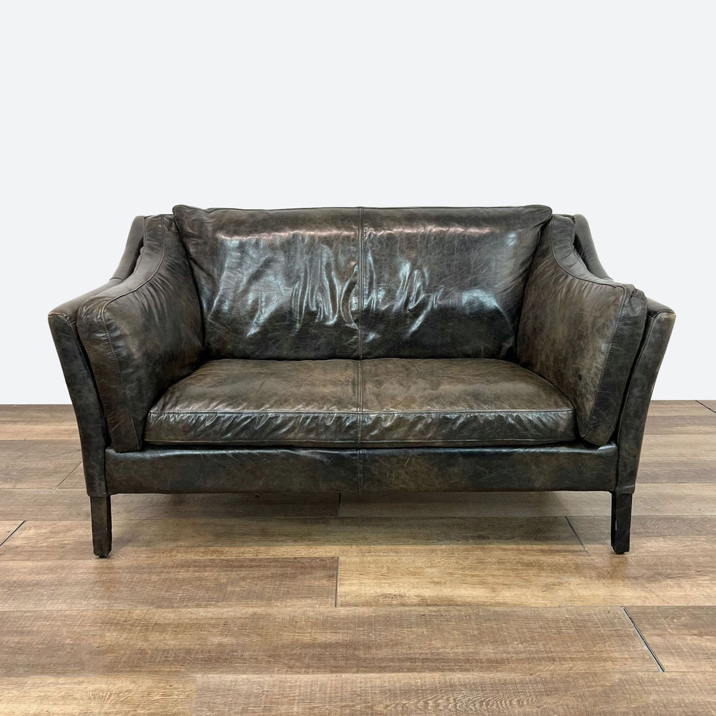 a vintage leather sofa, circa 1900.