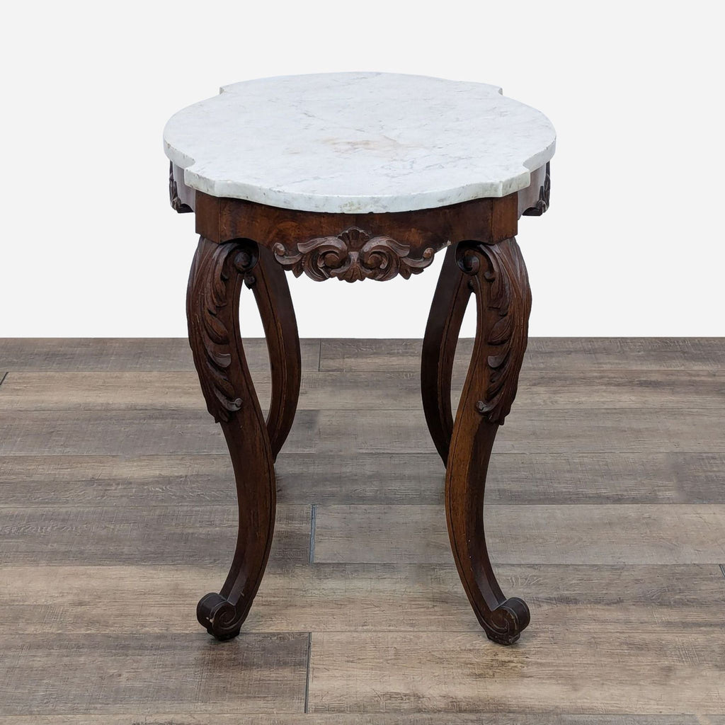 a 19th century french carved wood table