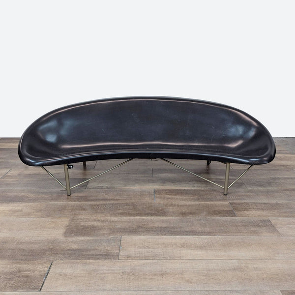 a black leather bench by [ unused0 ] for [ unused0 ]