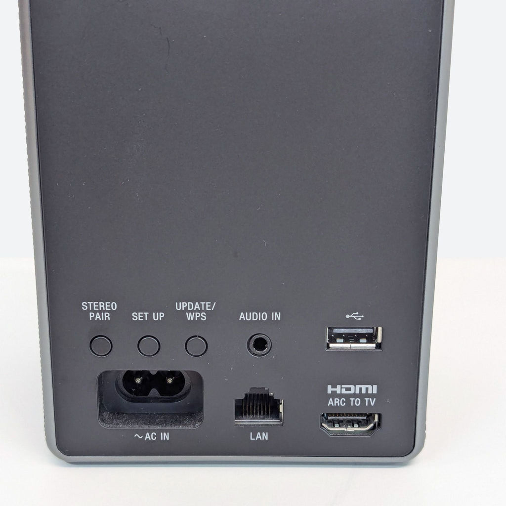 the back of the speaker is a small box with a small usb port.