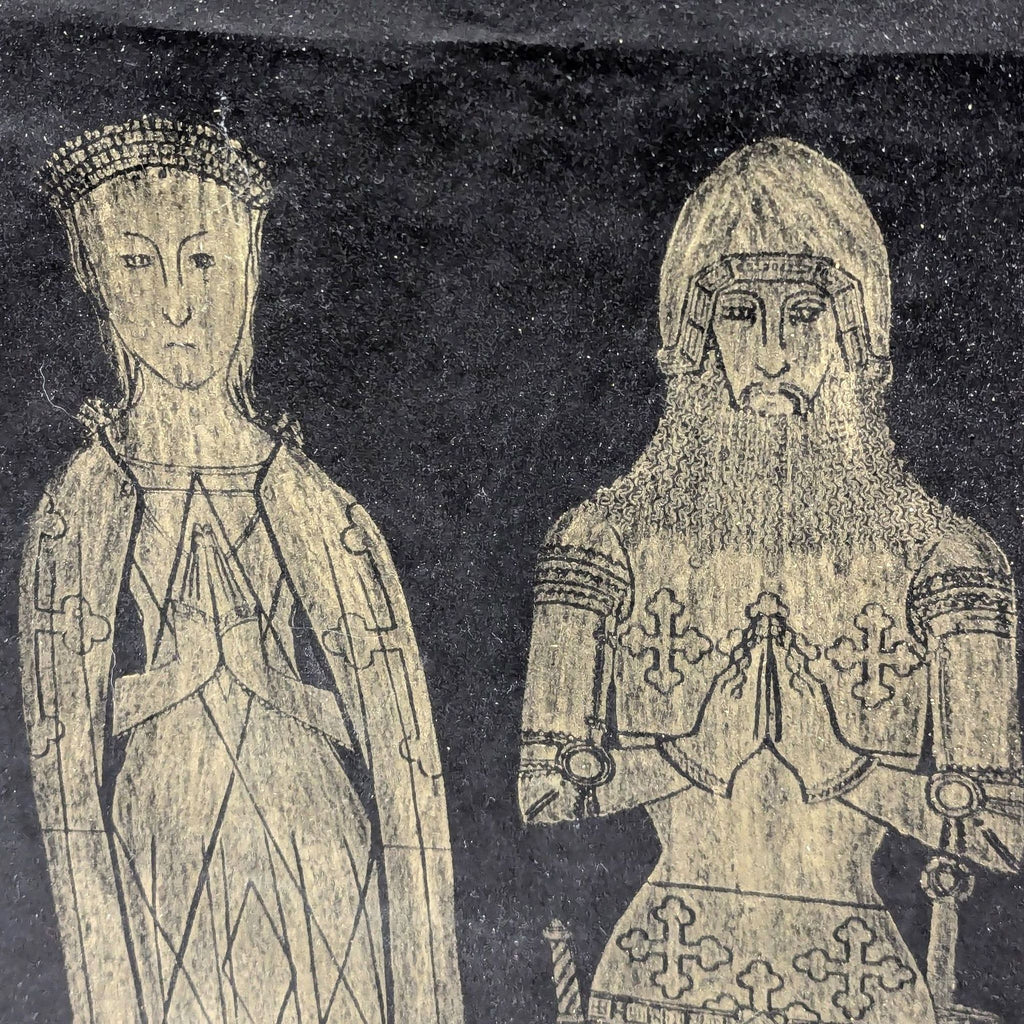 a black and white photo of two medieval figures