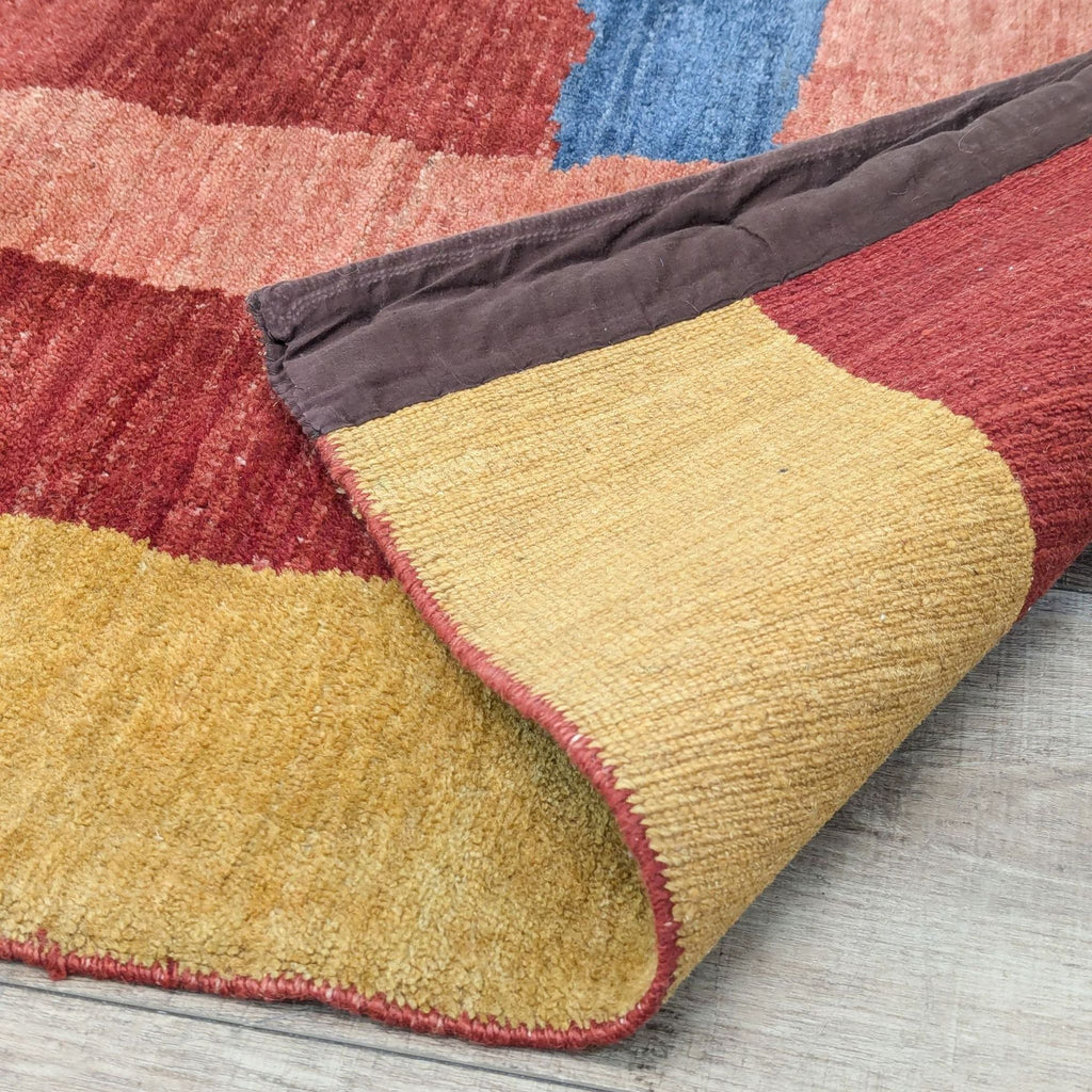 the curated nomad escolta handmade multicolor area rug