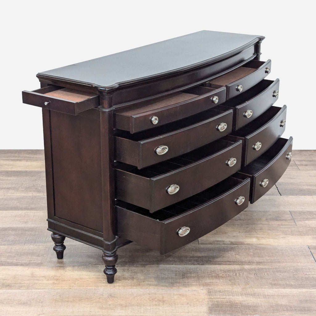 a large, dark brown chest of drawers with drawers.