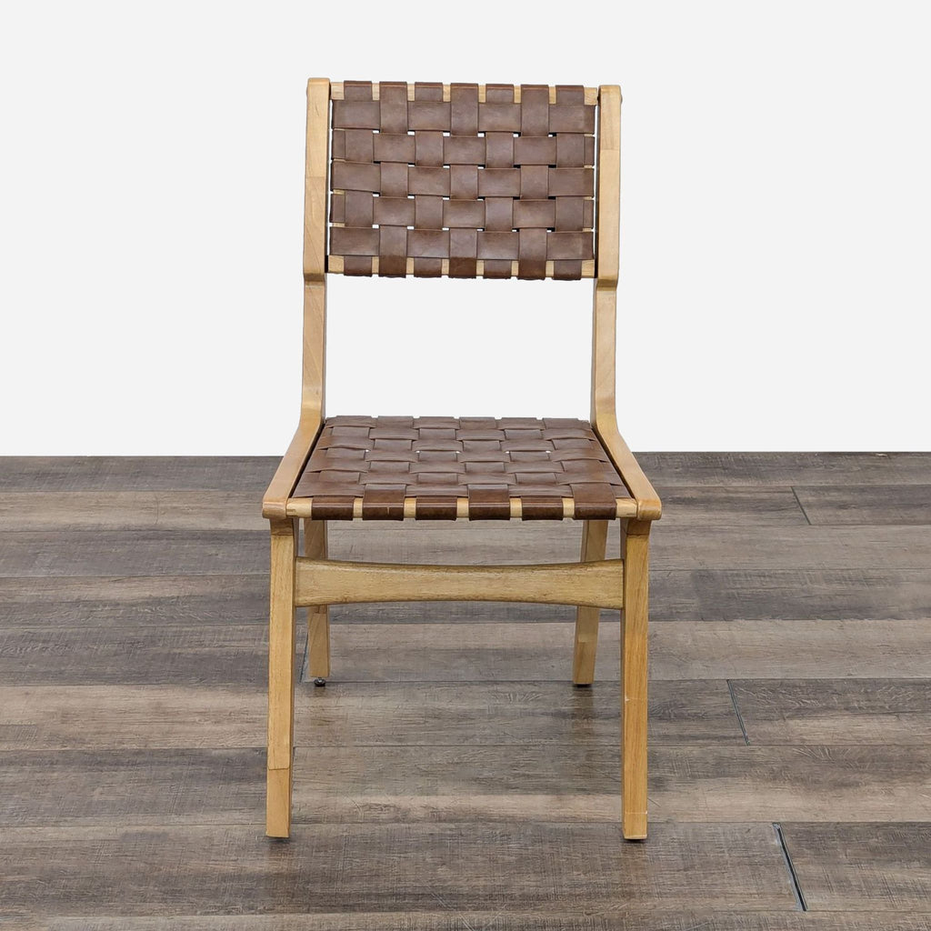 a set of four chairs in the style of [ unused0 ]