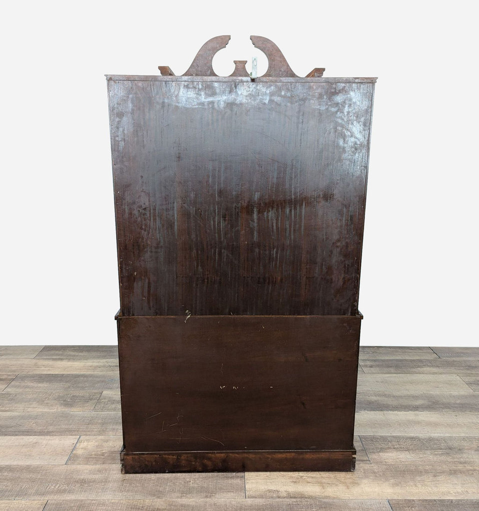 a vintage mahogany cabinet with a large front and a large front.