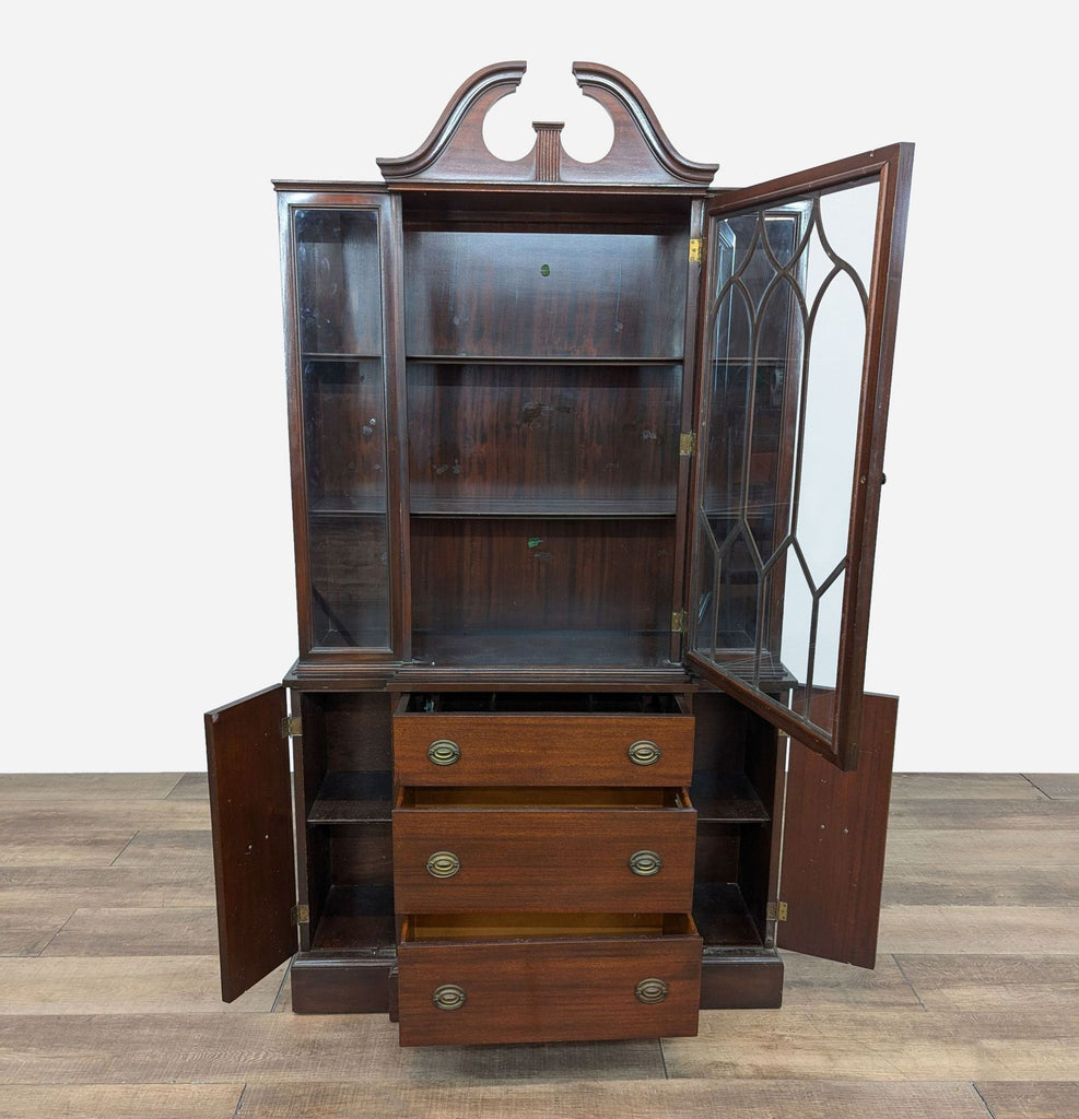 a victorian mahogany cabinet with a glass front and a glass front.