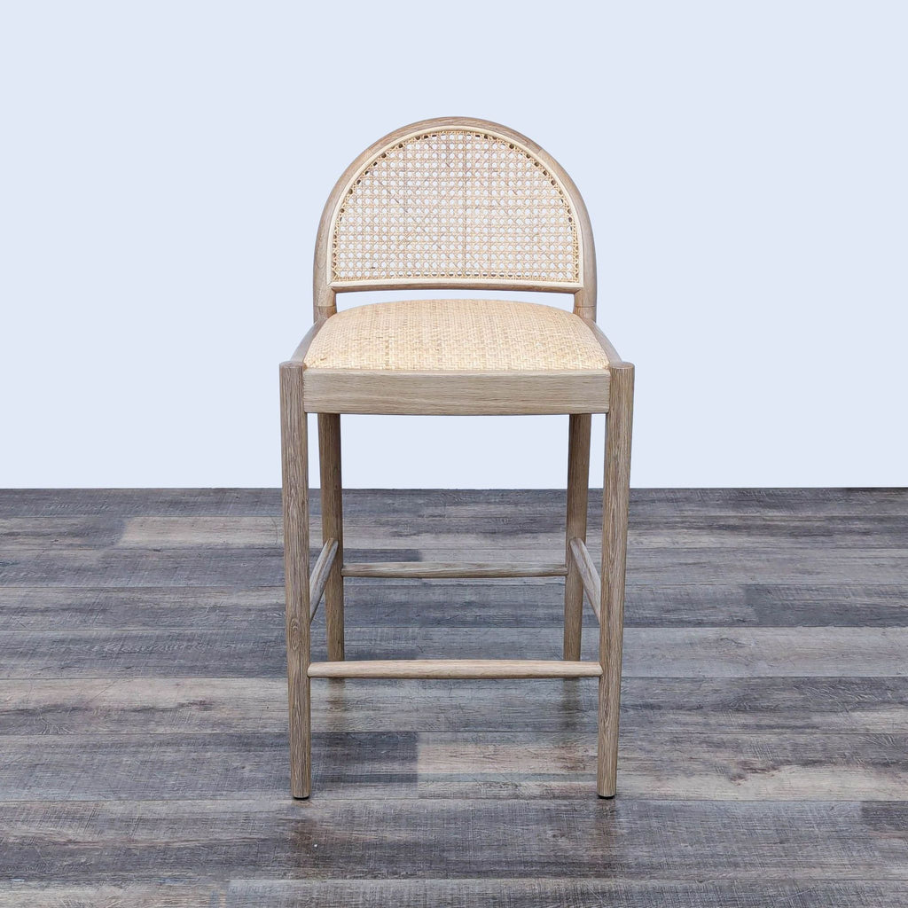 the [ unused0 ] chair is a modern, contemporary design with a woven seat and back.