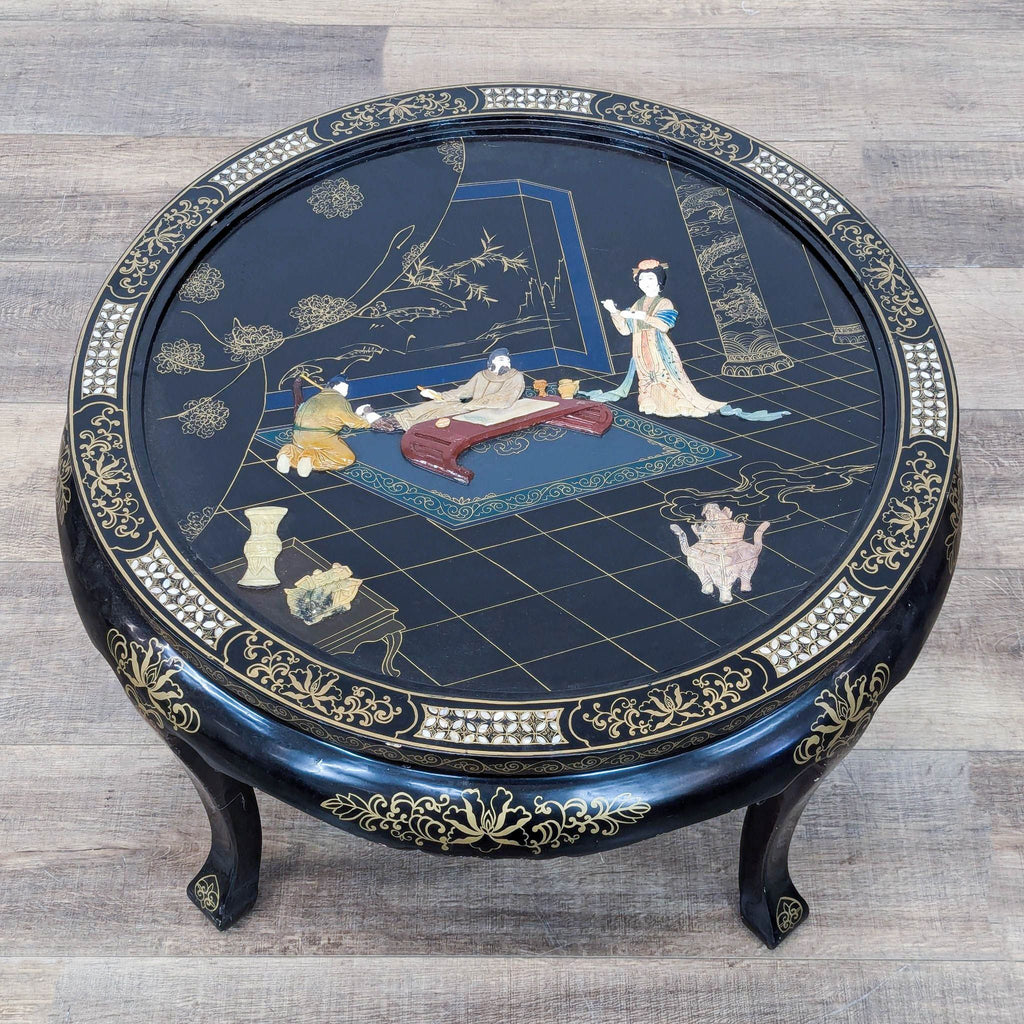 chinese porcelain table with a black lacquer base, with a large oriental scene, circa 1900