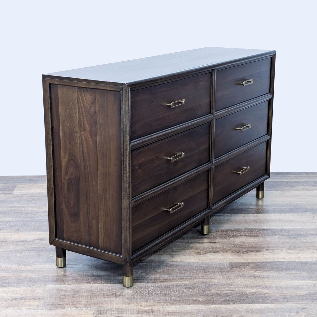 a large, dark wood dresser with a dark brown finish.