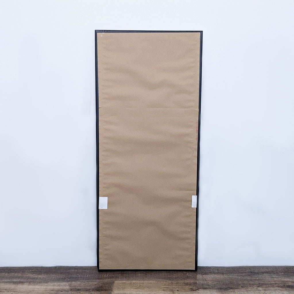 the door is made of cardboard and has a sheet of paper on it.