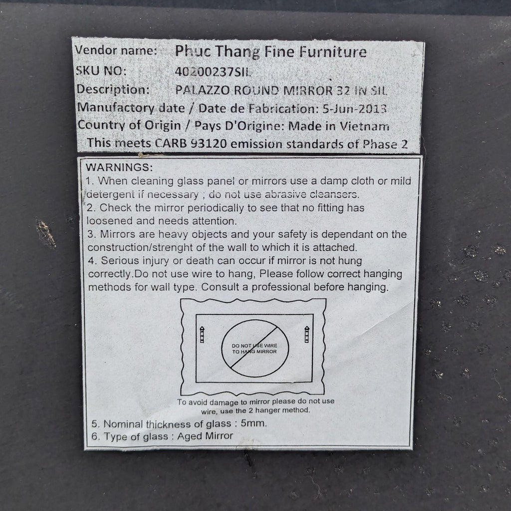 a label on a metal box with a clear plastic sheet.