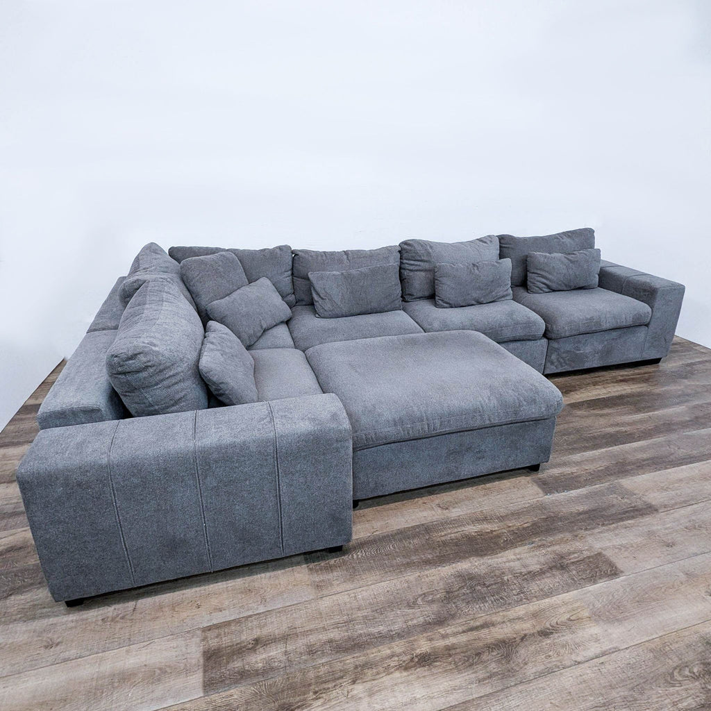 the [ unused0 ] sectional sofa is a modern design with a modern design. the sectional sofa