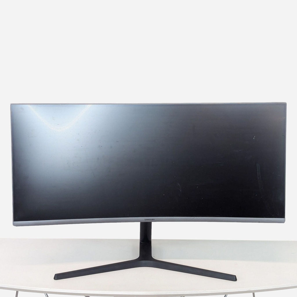 a large, black, and white computer monitor.