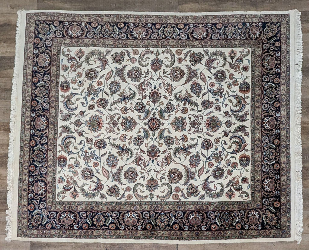 a large persian rug with a floral pattern.