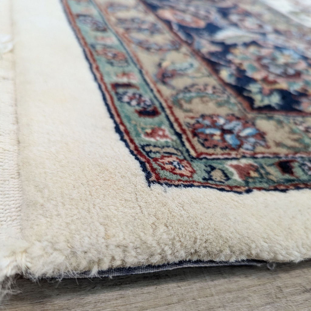 a close up of a handmade persian rug.